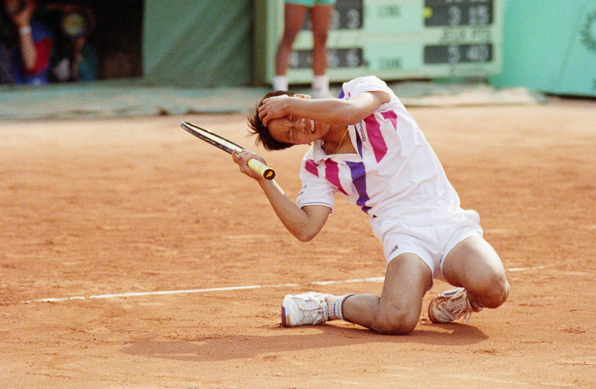 Michael Chang Expressing Deep Emotion During A Tennis Match Wallpaper