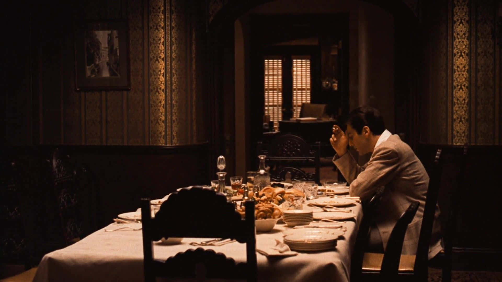 Michael Corleone alene ved bordet tapet Wallpaper