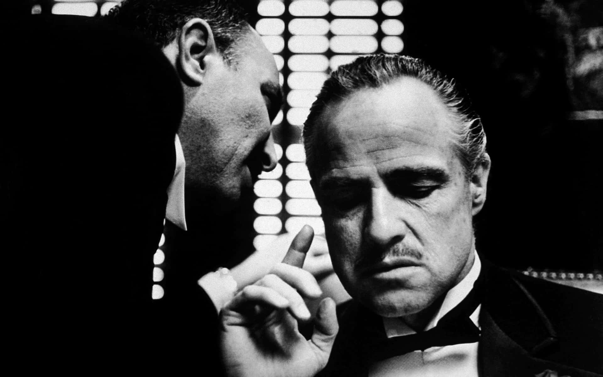 The Godfather - A Black And White Photo Of Two Men Wallpaper