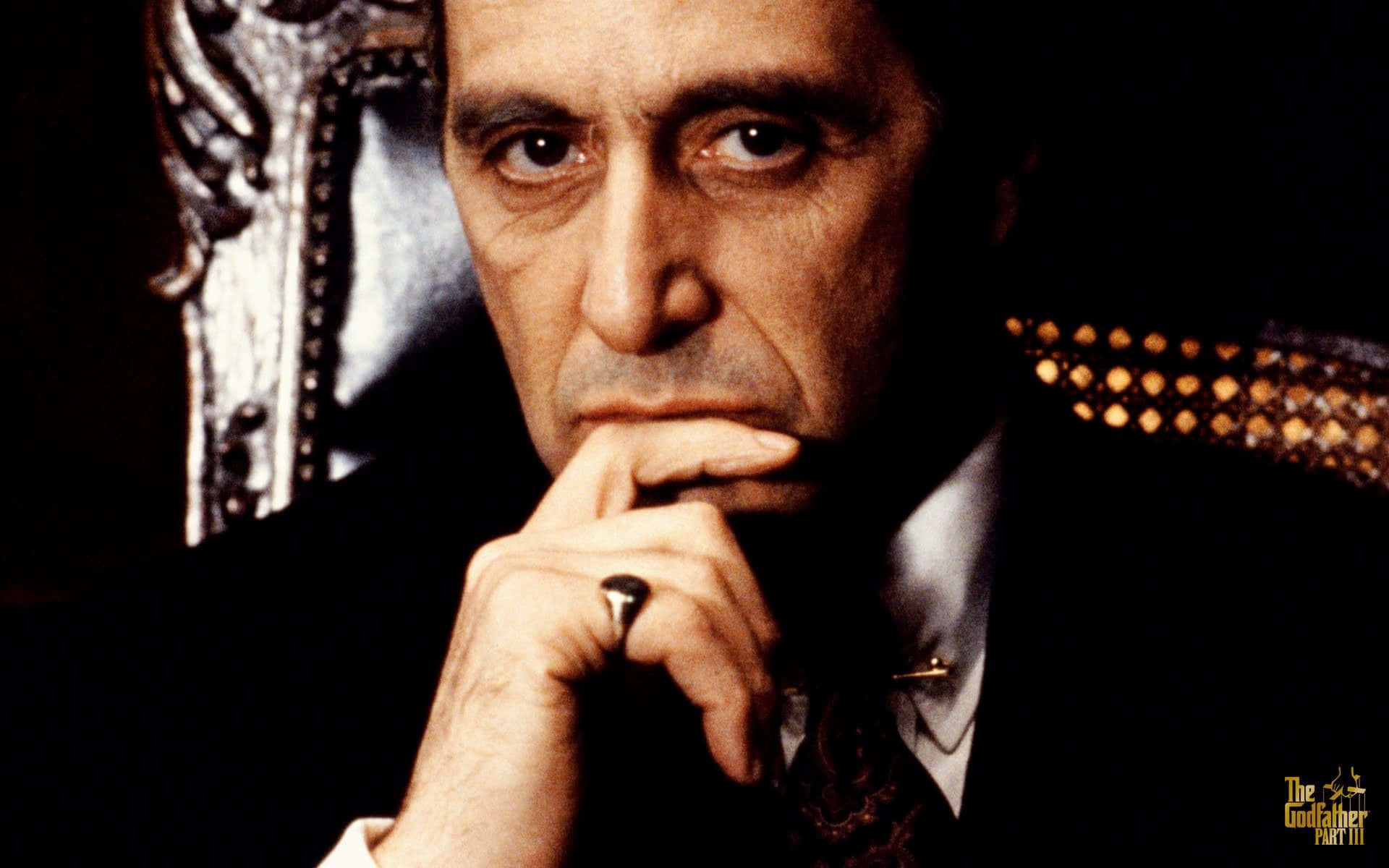 "Michael Corleone, played by Al Pacino, in Francis Ford Coppola's classic movie, The Godfather." Wallpaper