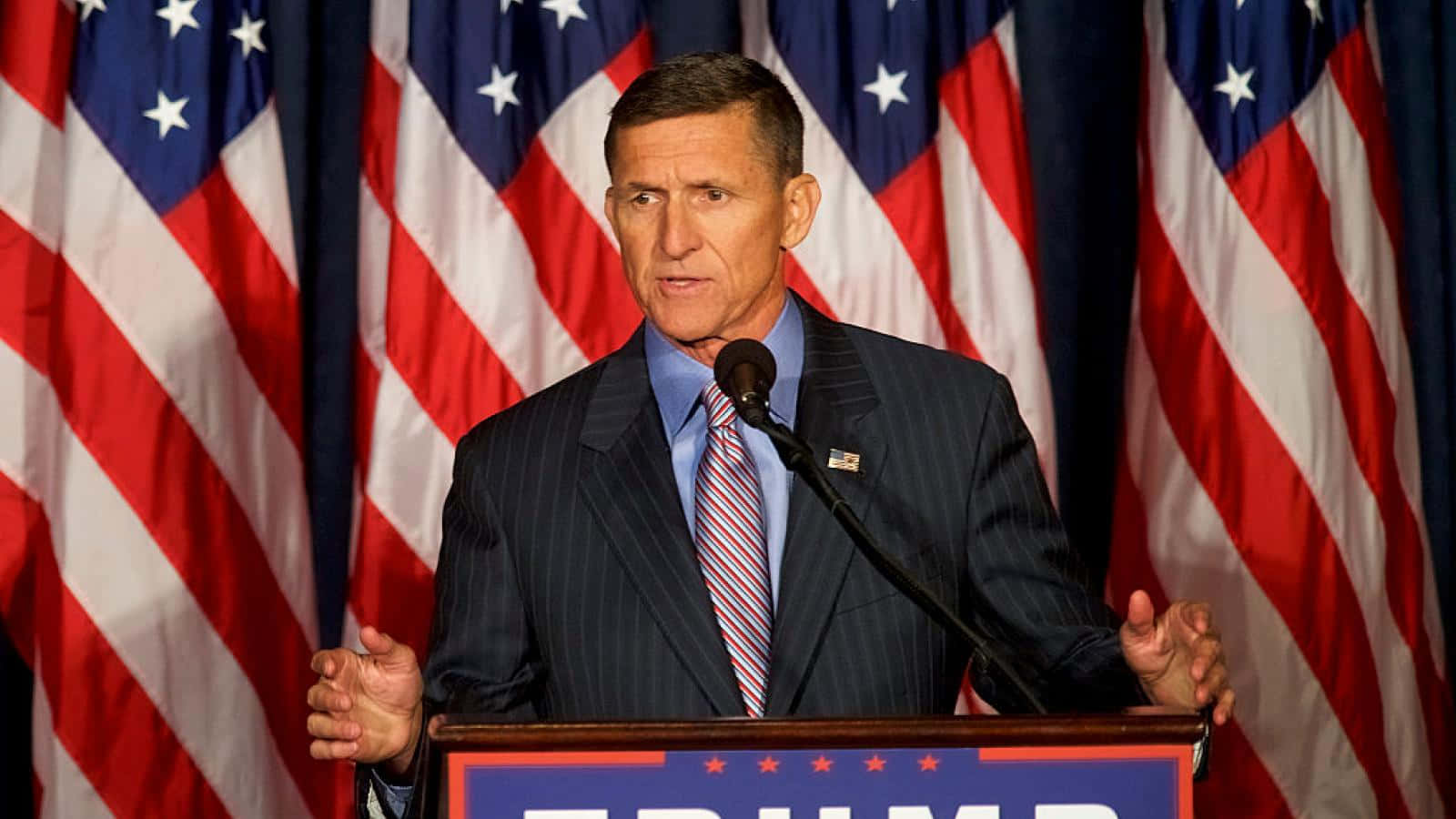 Michael Flynn Speakingat Podium Wallpaper