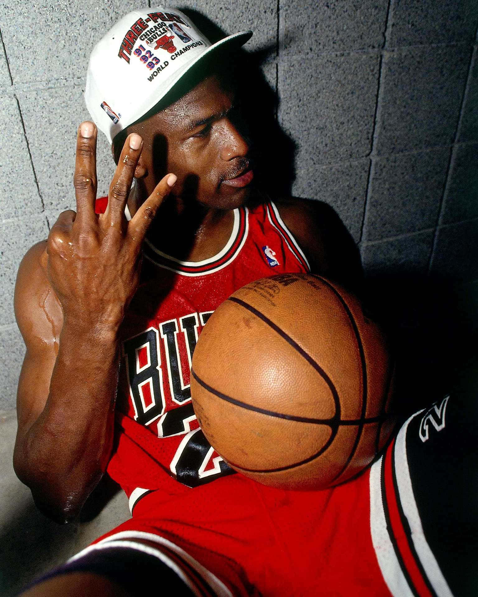 Få en af de største atleter nogensinde på din mobil med Michael Jordan iPhone tapet. Wallpaper