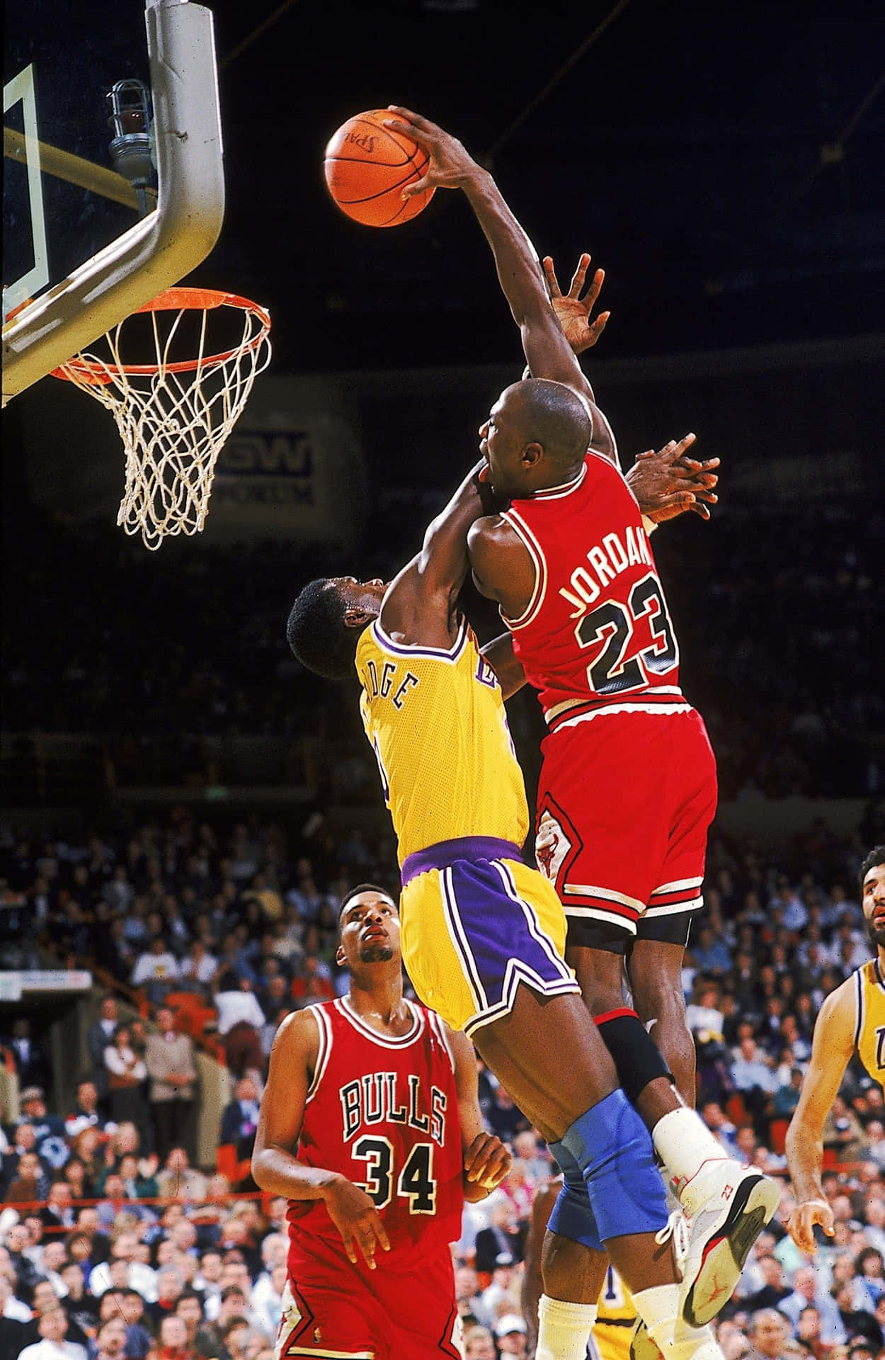 Air Jordan Soaring High: Celebrating Basketball Legend Michael Jordan On Iphone Wallpaper Wallpaper