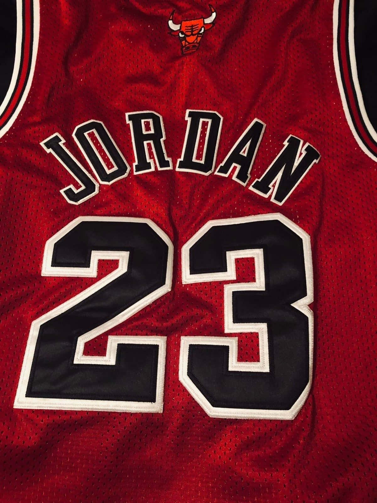 Fejr NBA-legenden Michael Jordan med dette klassiske jersey. Wallpaper