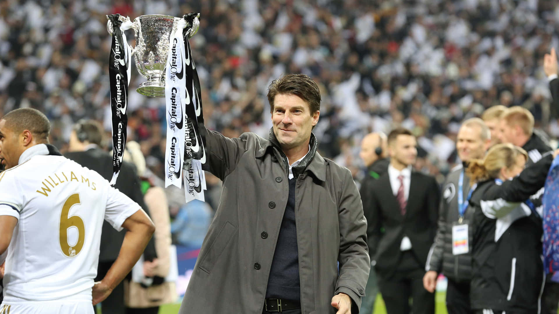 Michael Laudrup Holding Capital One Cup Wallpaper
