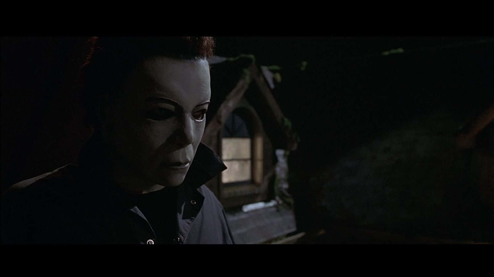Michael Myers looms in the shadows, ready to strike.