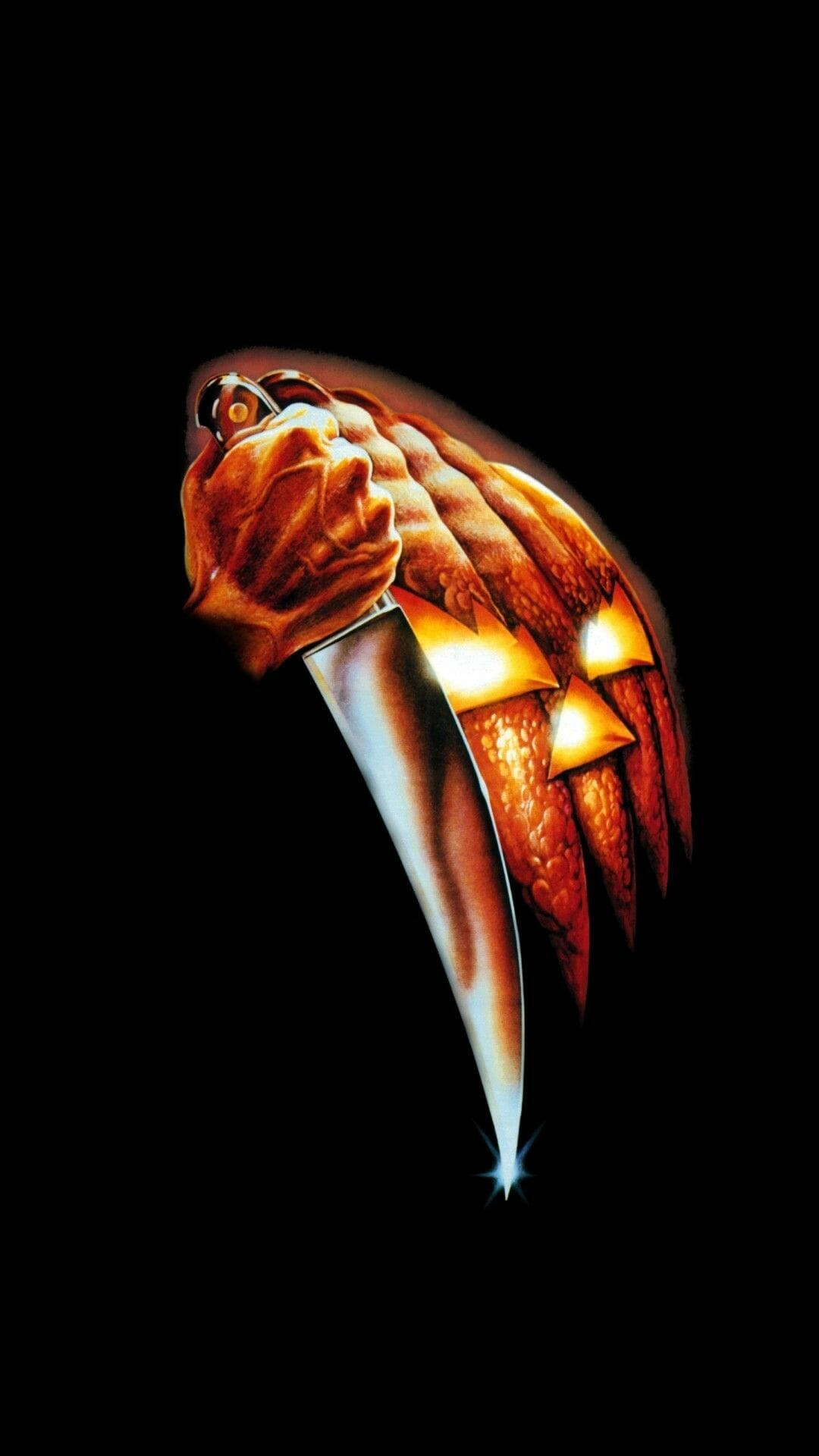 A Skull With A Knife In It Wallpaper