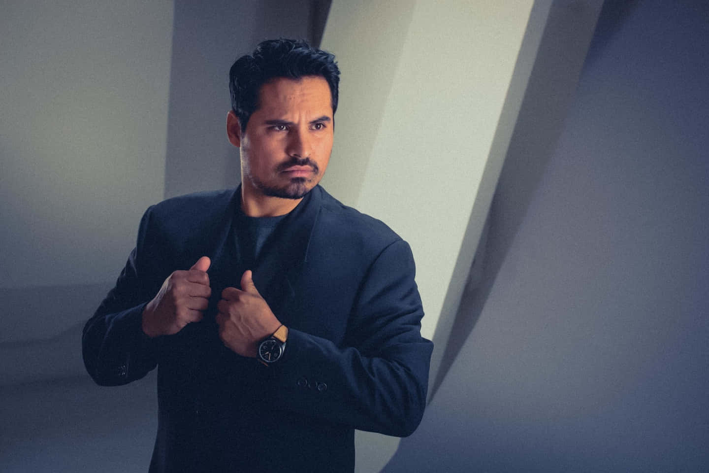 Accomplished Actor Michael Peña in Pensive Mood Wallpaper