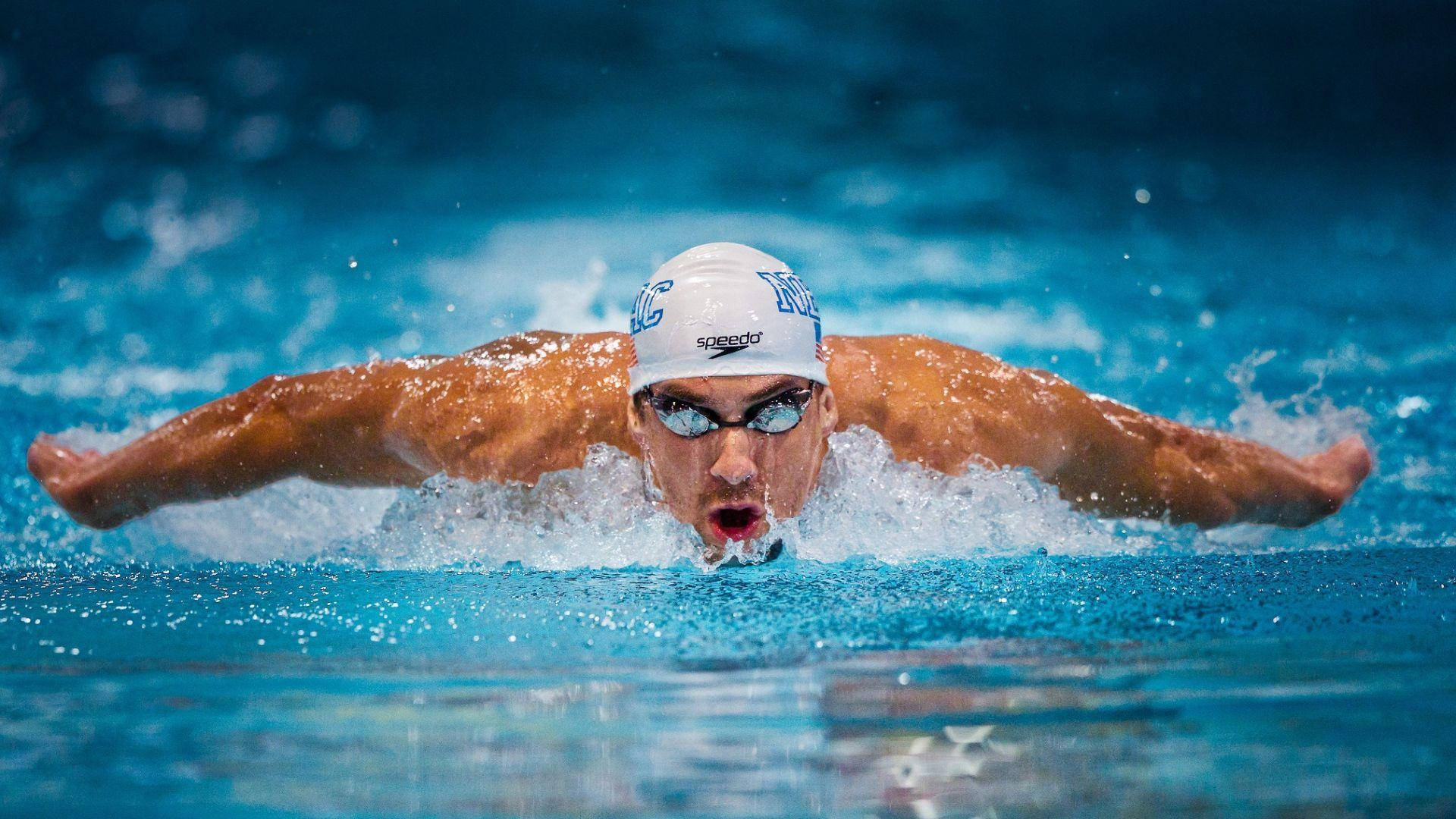 Papelde Parede Do Michael Phelps Na Água Azul. Papel de Parede