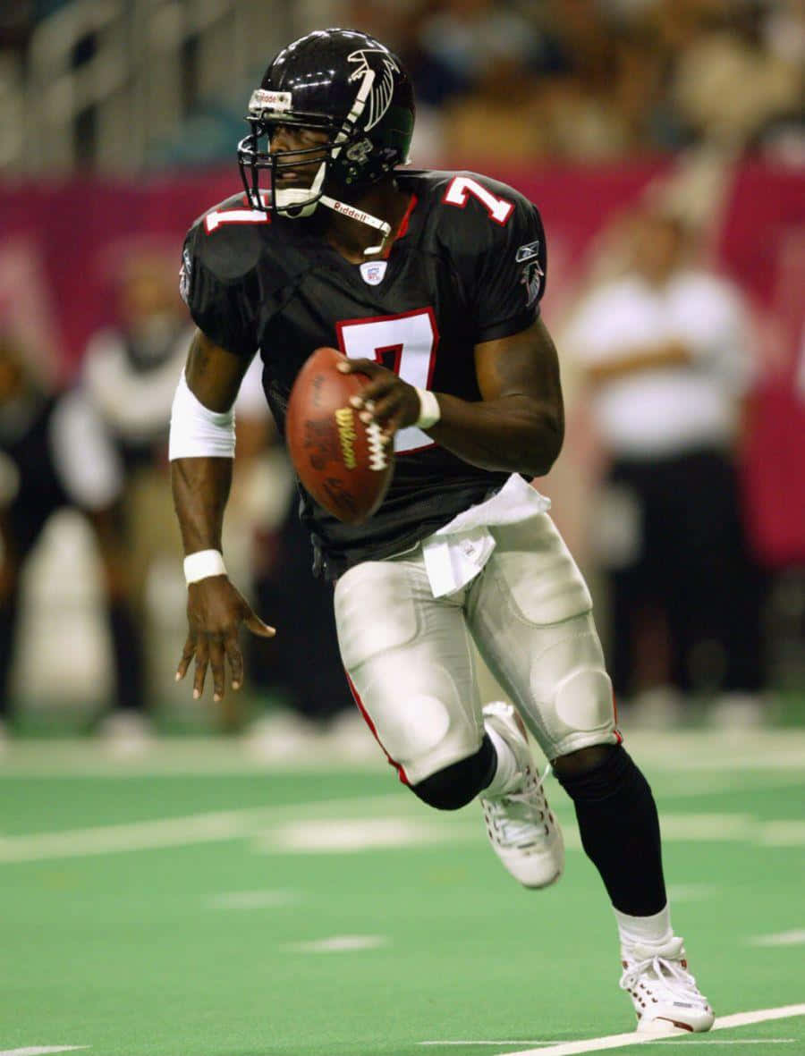 Michael Vick i aktion under 2004 NFL-sæsonen Wallpaper
