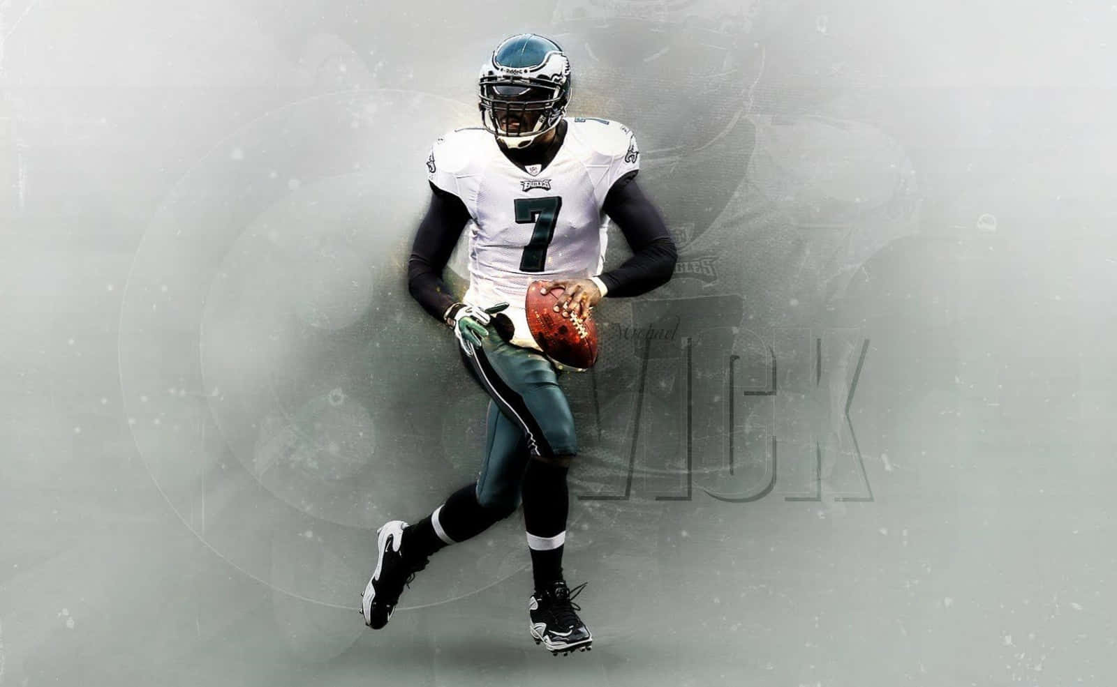 Download Michael Vick in Action Playing Football Wallpaper
