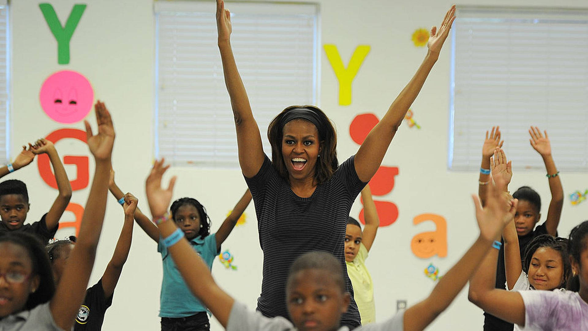 Michelle Obama Yoga With Kids Wallpaper