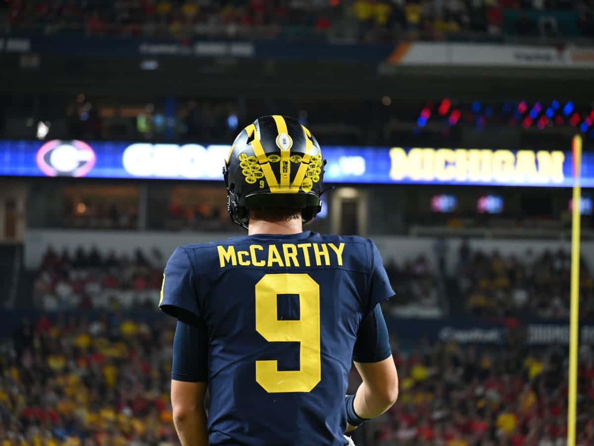 Michigan Fotballspiller Mc Carthy9 Drakt Bakgrunnsbildet