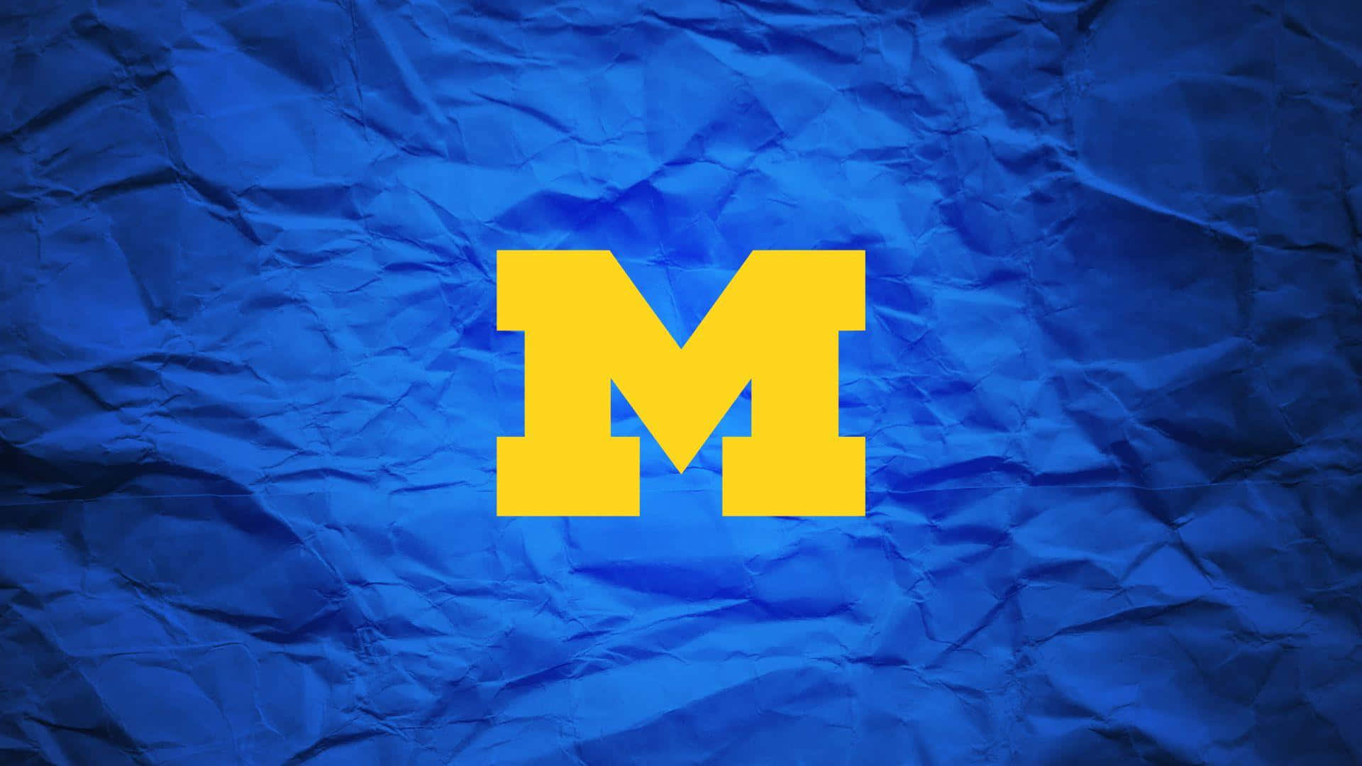 Slå blåt! Michigan Football er suverænt Wallpaper