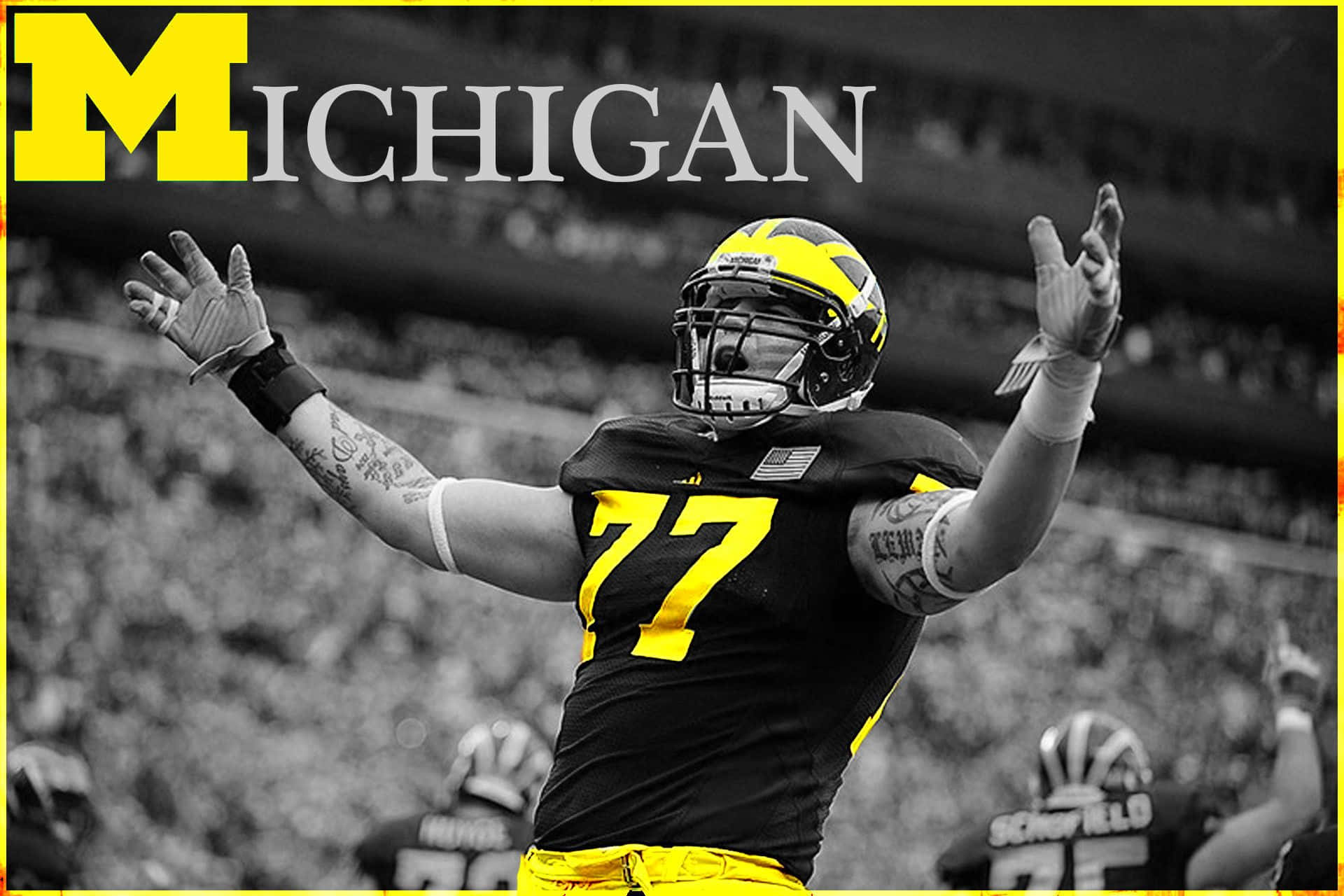 Michigan Wolverines team in action during a thrilling game Wallpaper