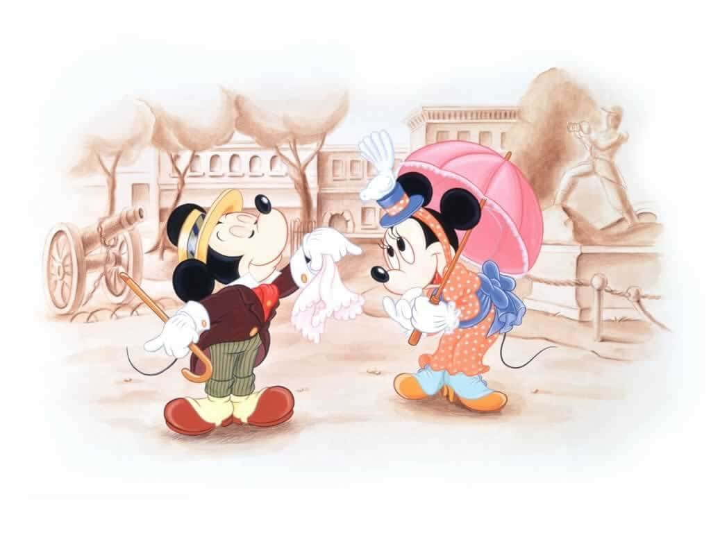 Mickey And Minnie Mouse Are Holding Umbrellas