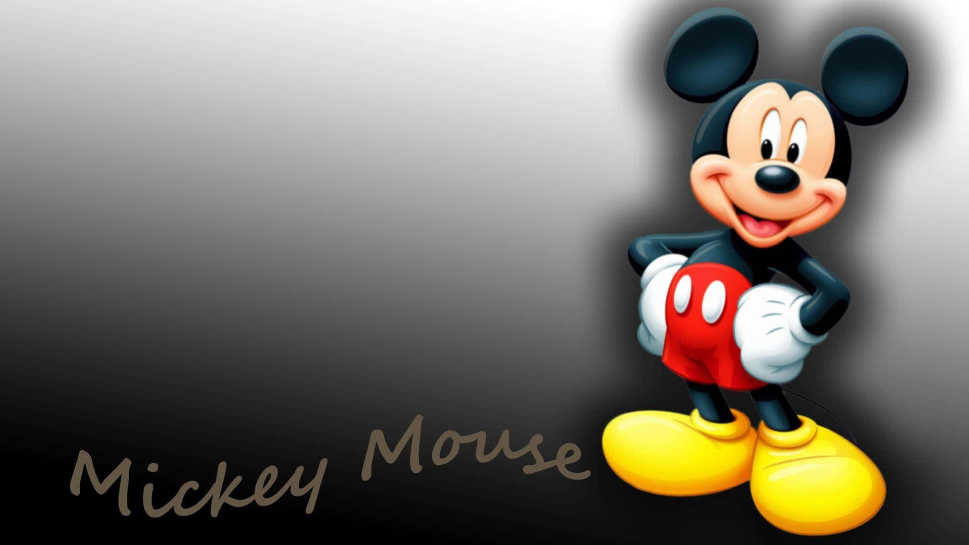 Enjoy the fun and joy of childhood with this Mickey Mouse desktop wallpaper. Wallpaper