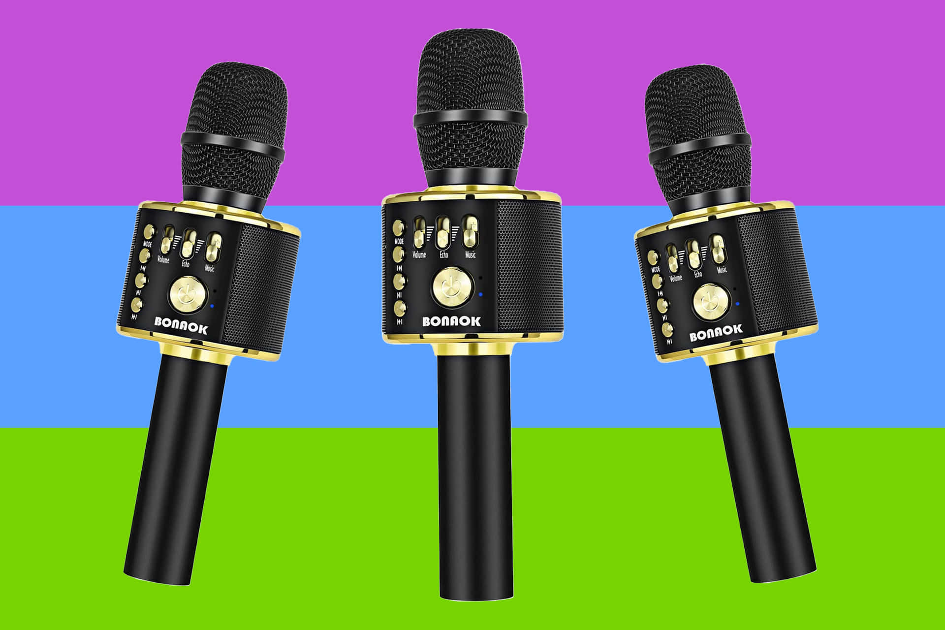 Three Microphones On A Rainbow Colored Background