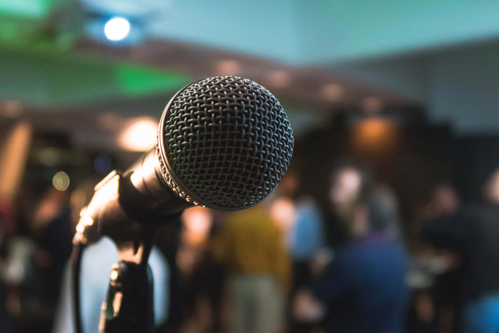 Microphone In Front Of A Crowd Wallpaper