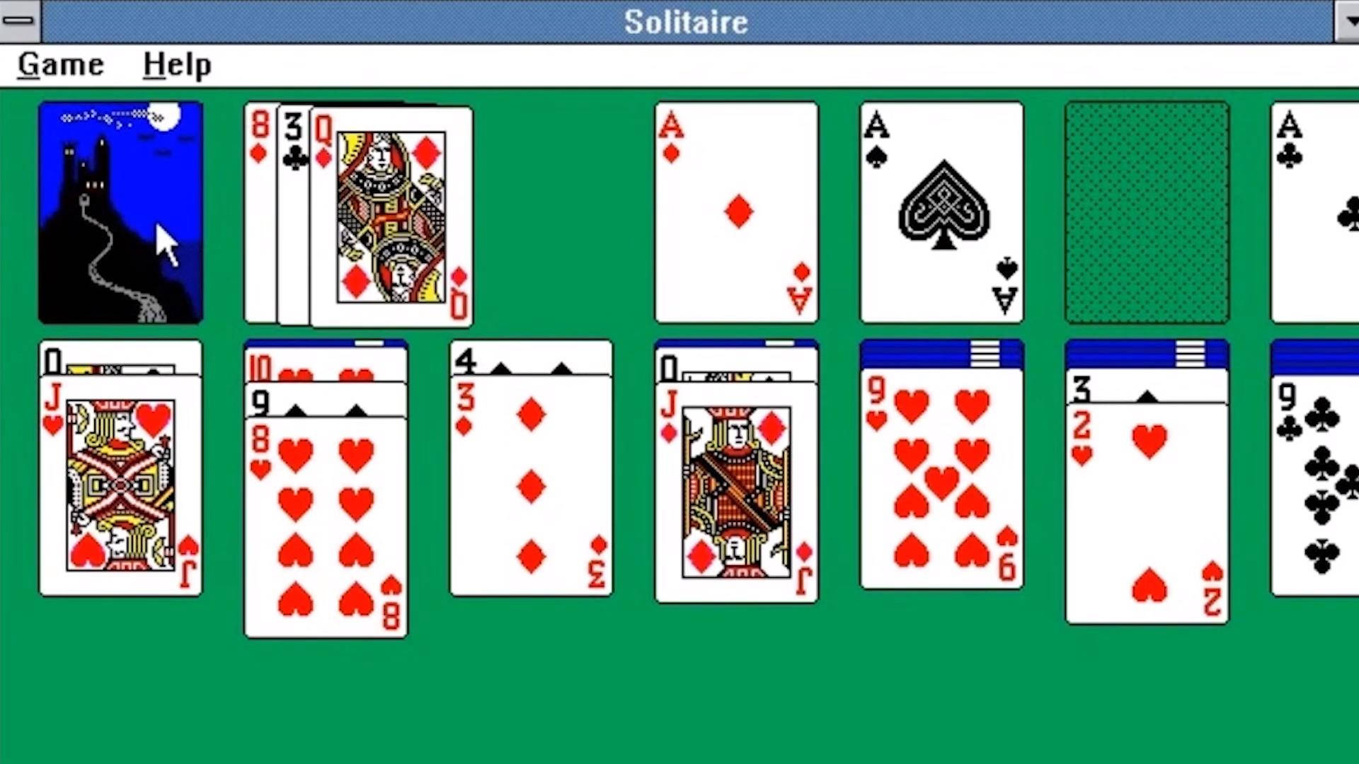 Spil kortspil Microsoft Solitaire på en sødrosa baggrund Wallpaper