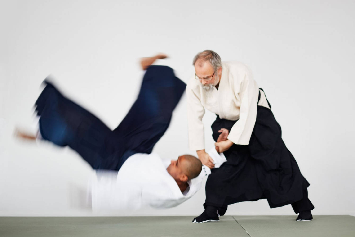 Mid Action Koshi Nage Aikido Technique Wallpaper