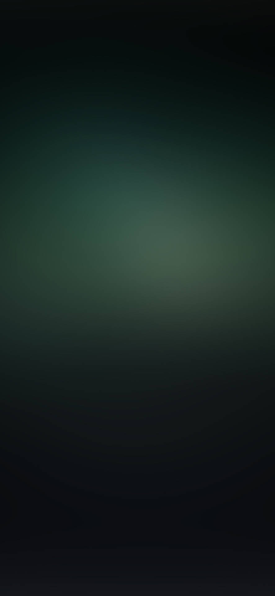 A Dark Green Background With A Blurred Background Wallpaper