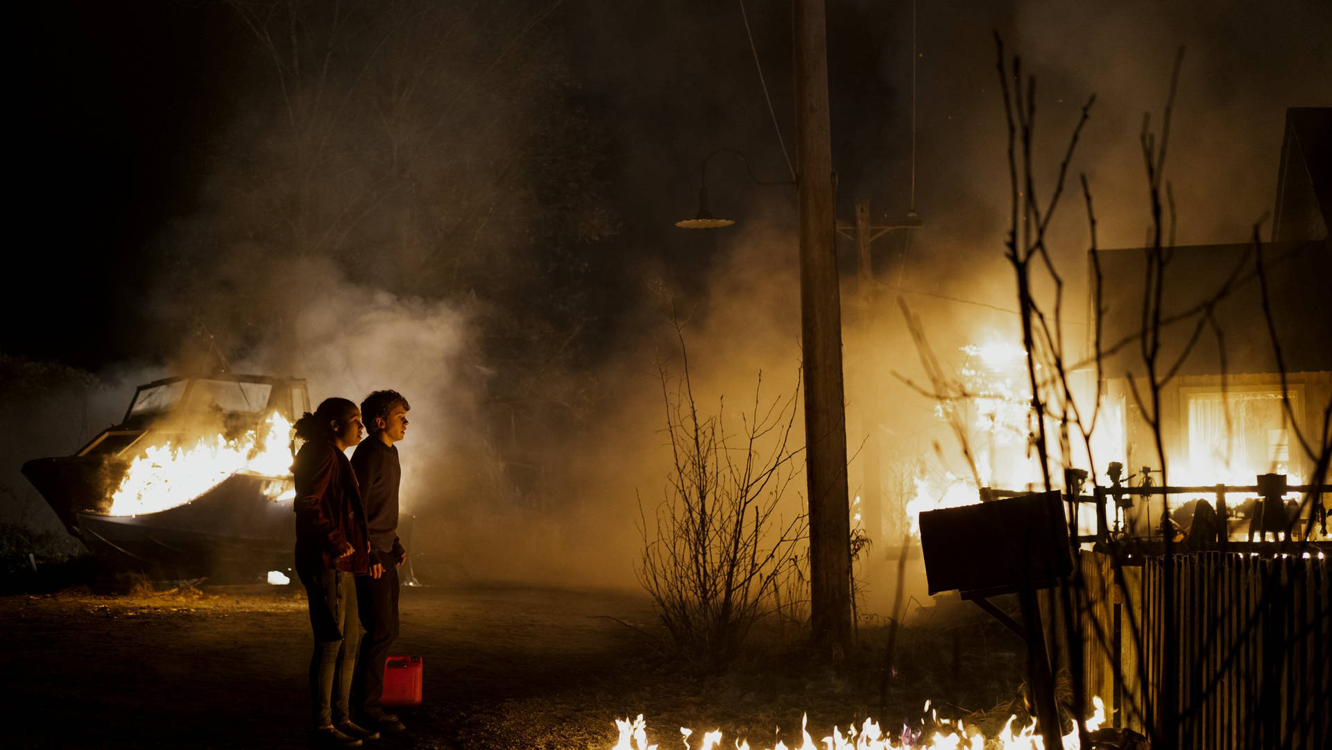 Midnight Mass Teenagers On Burning House Background