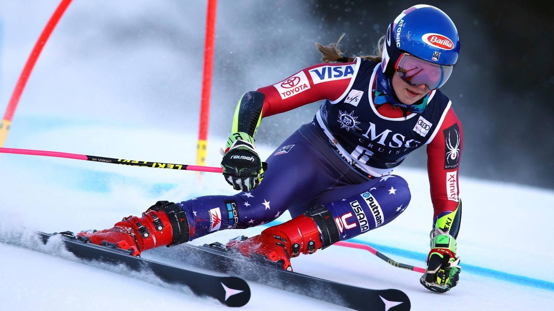 Wallpaper: Se Mikaela Shiffrin nedfarten alpine skiløb Tapet: Wallpaper