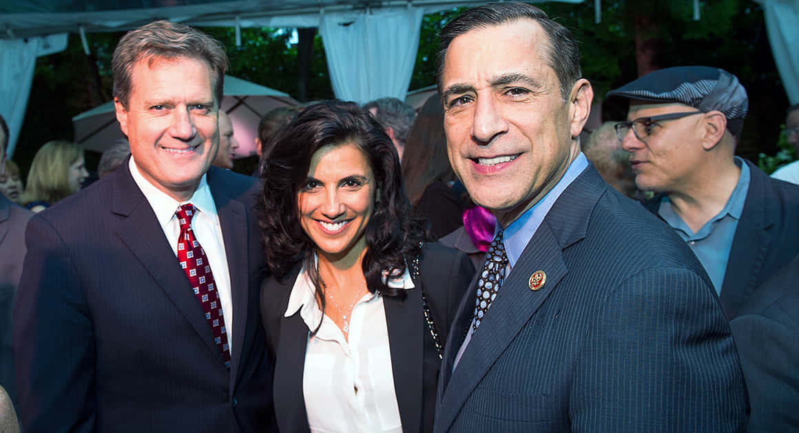 U.S. Representatives Mike Turner, Majida Mourad, and Darrell Issa photographed at a public event. Wallpaper