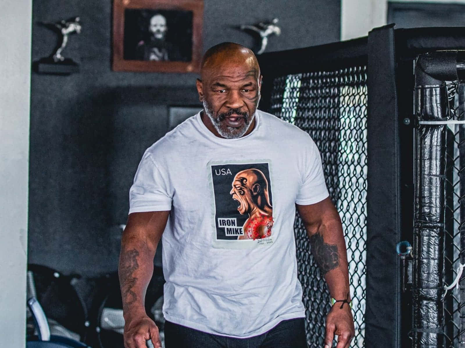 Mike Tyson in his prime, showcasing his fighting spirit and determination
