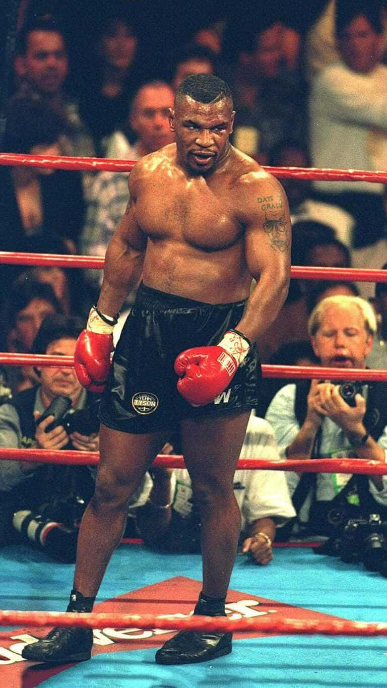 Mike Tyson posing in boxing gear