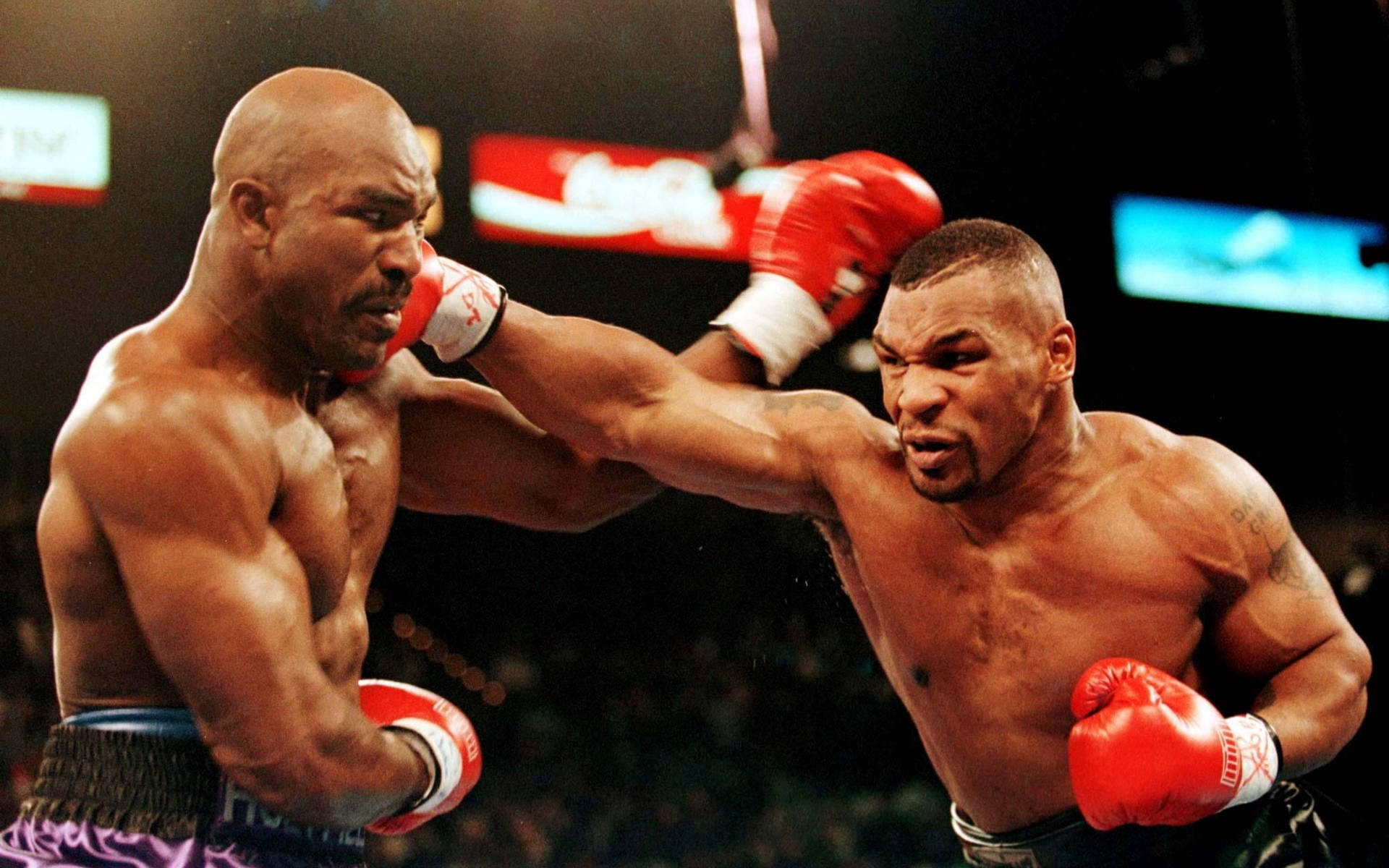 Mike Tyson Punches Evander Holyfield Wallpaper