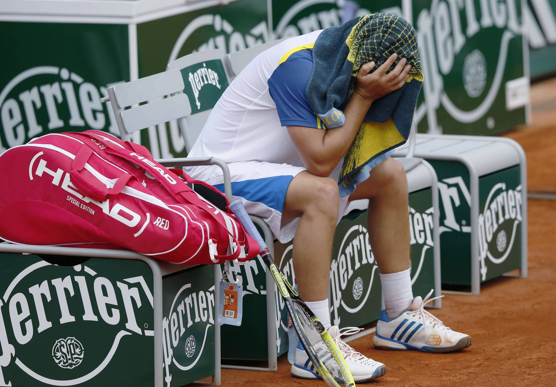 Exhausted Mikhail Youzhny in a Post-Match Moment Wallpaper