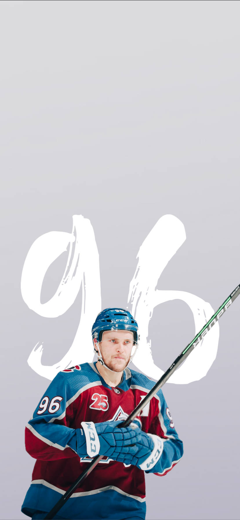 Mikko Rantanen holder hockeystav med begge hænder Wallpaper