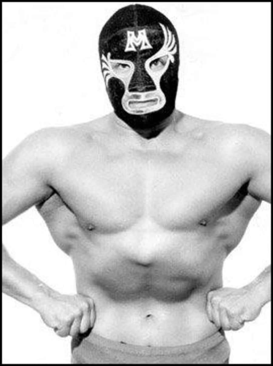 Legendary Wrestler Mil Mascaras Showcasing Physical Prowess Wallpaper