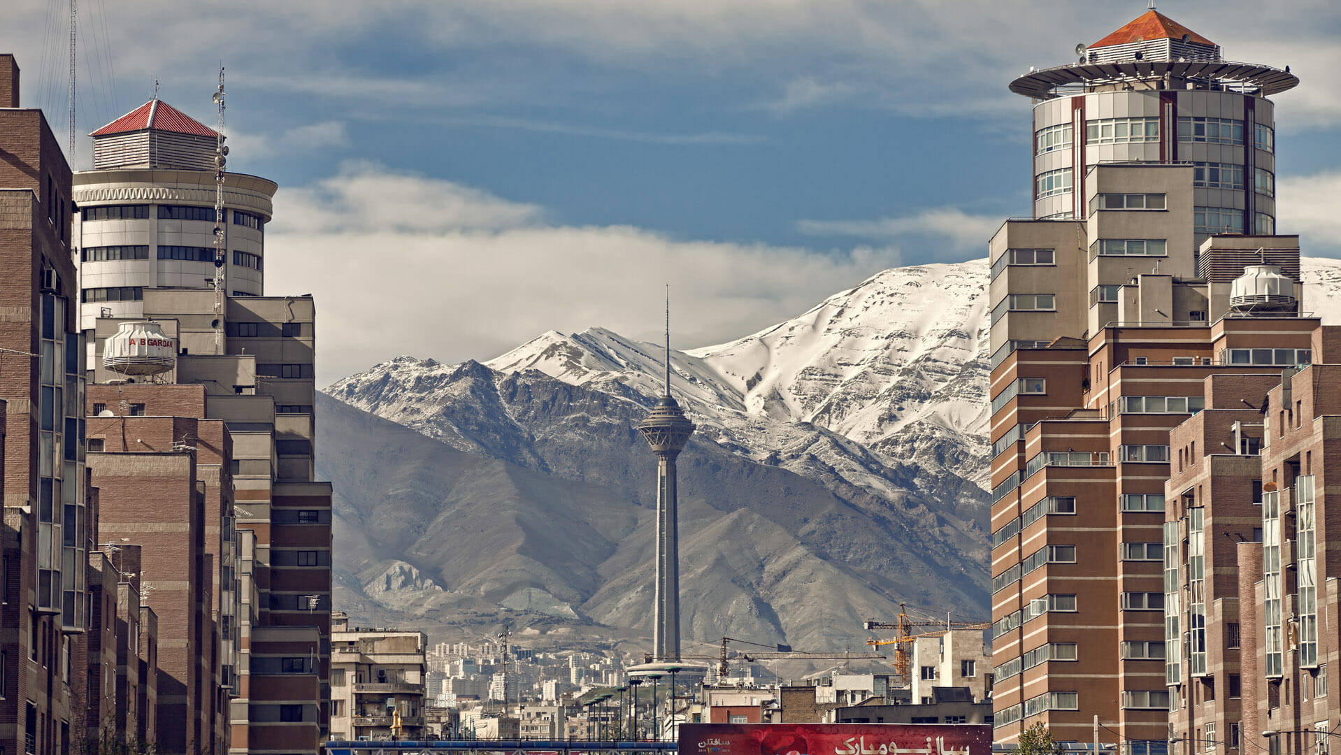 Caption: The Majestic Milad Tower Against the Skyline of Tehran, Iran Wallpaper