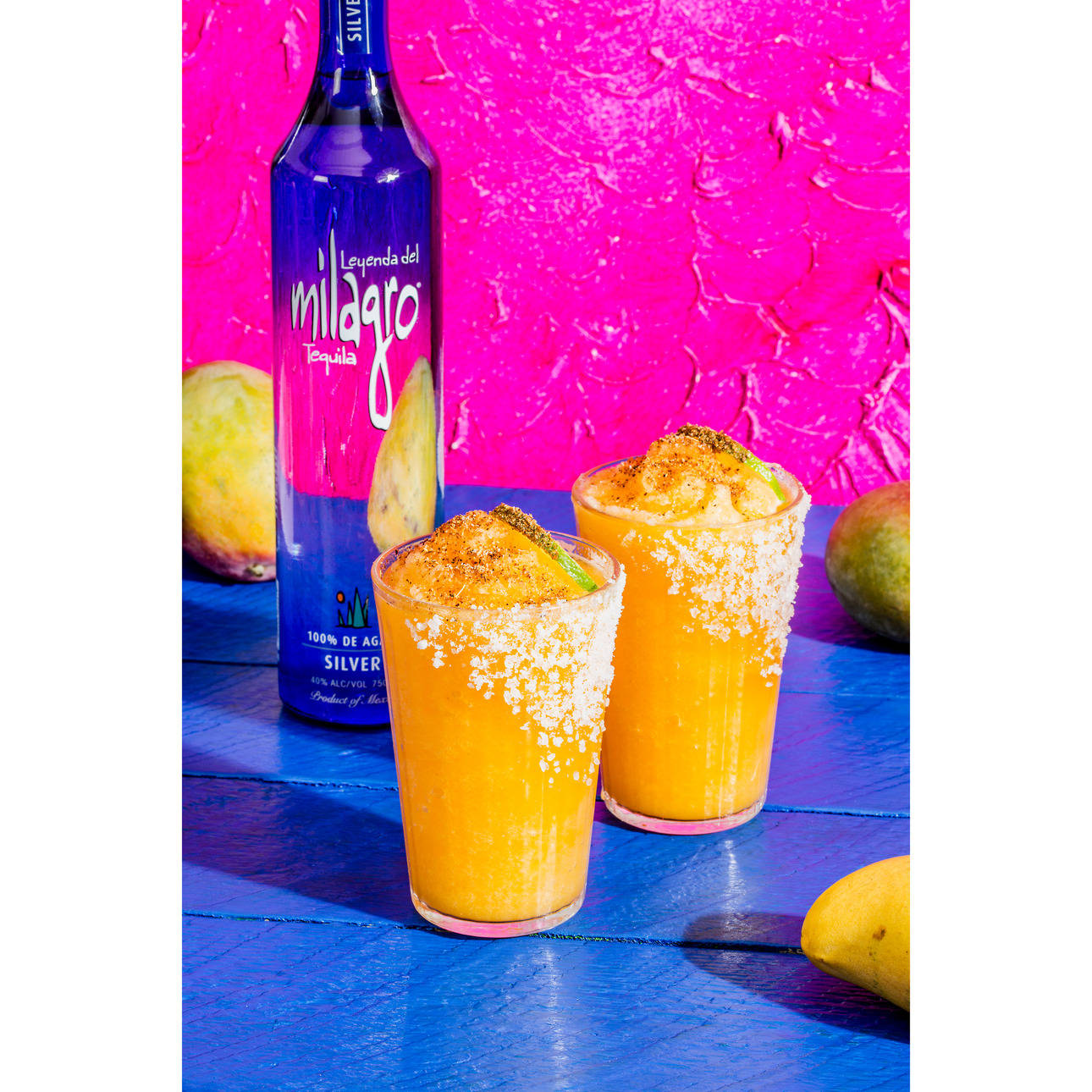 Milagro Tequila og Mango Helado Cocktail Wallpaper Wallpaper