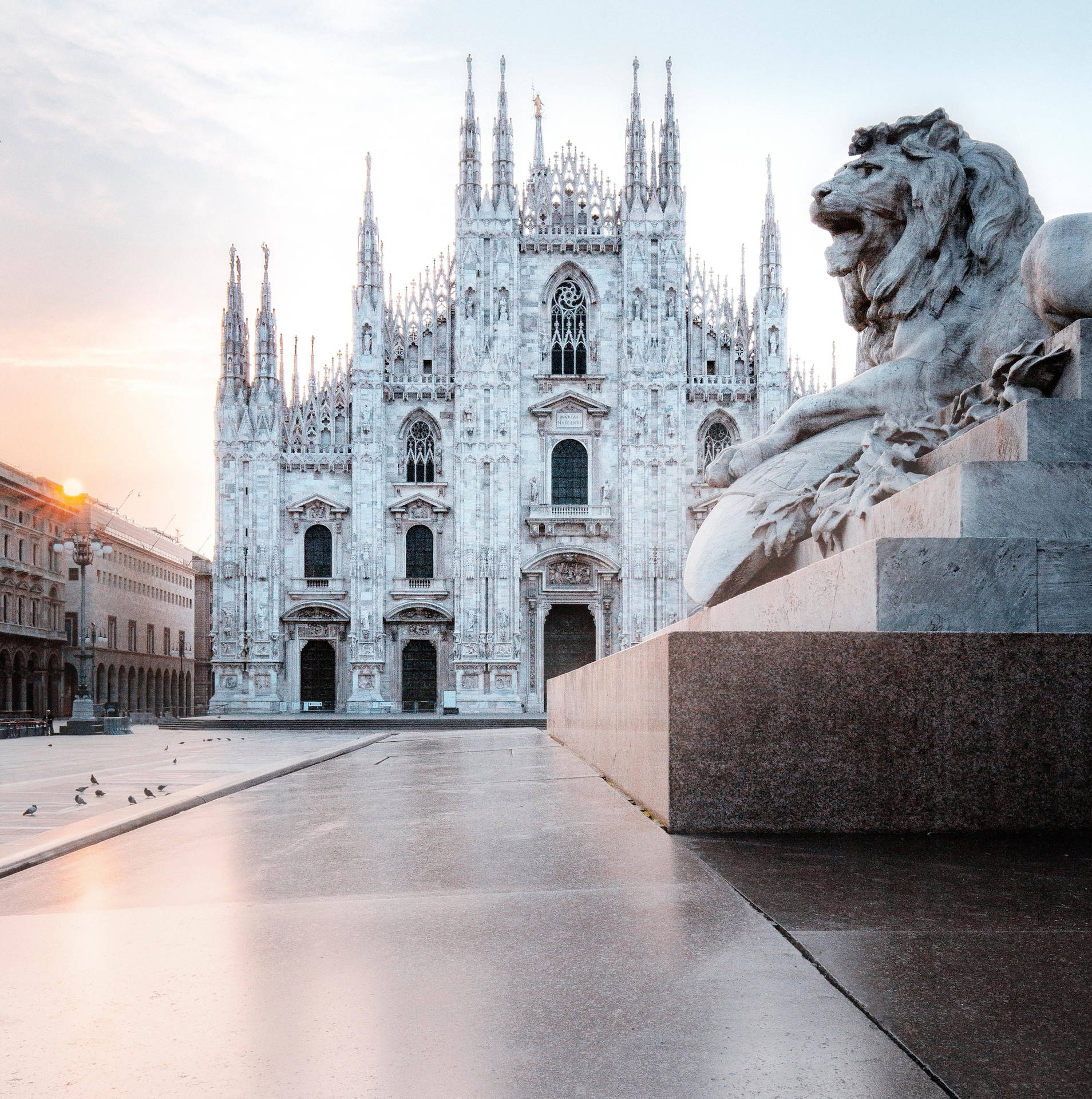 Milan's Cathedral With A Lion Statue Picture