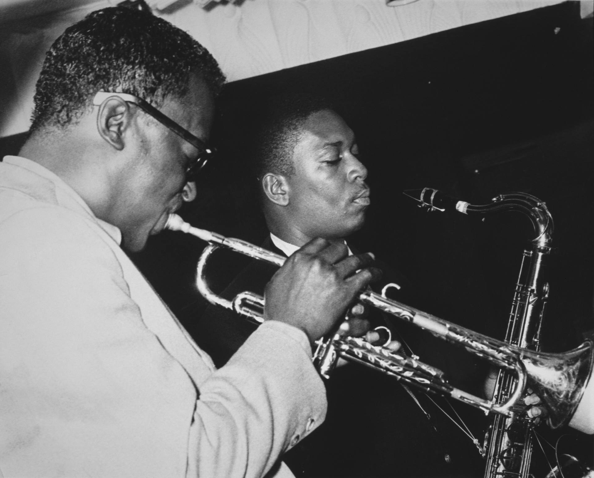 Iconeleggendarie Del Jazz - Miles Davis E John Coltrane Sfondo