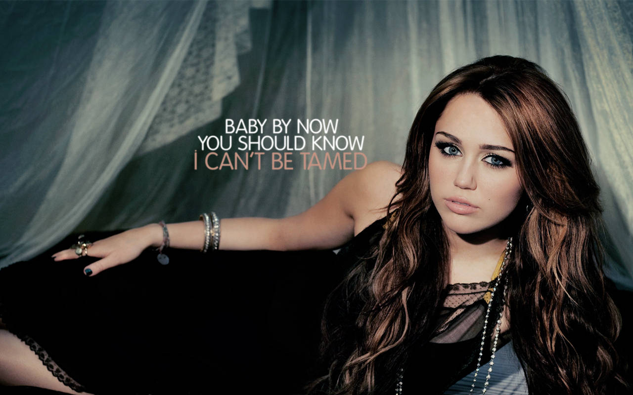 Miley Cyrus Can't Be Tamed Lyrics Background