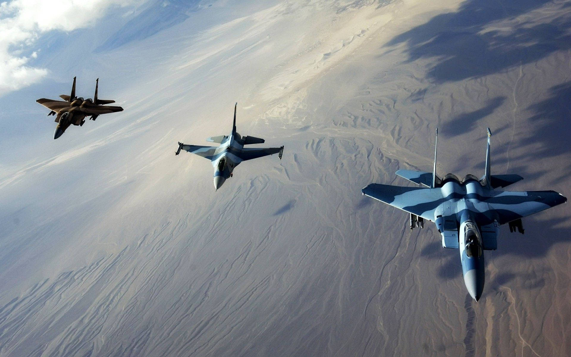 Three Fighter Jets Flying In The Sky Wallpaper