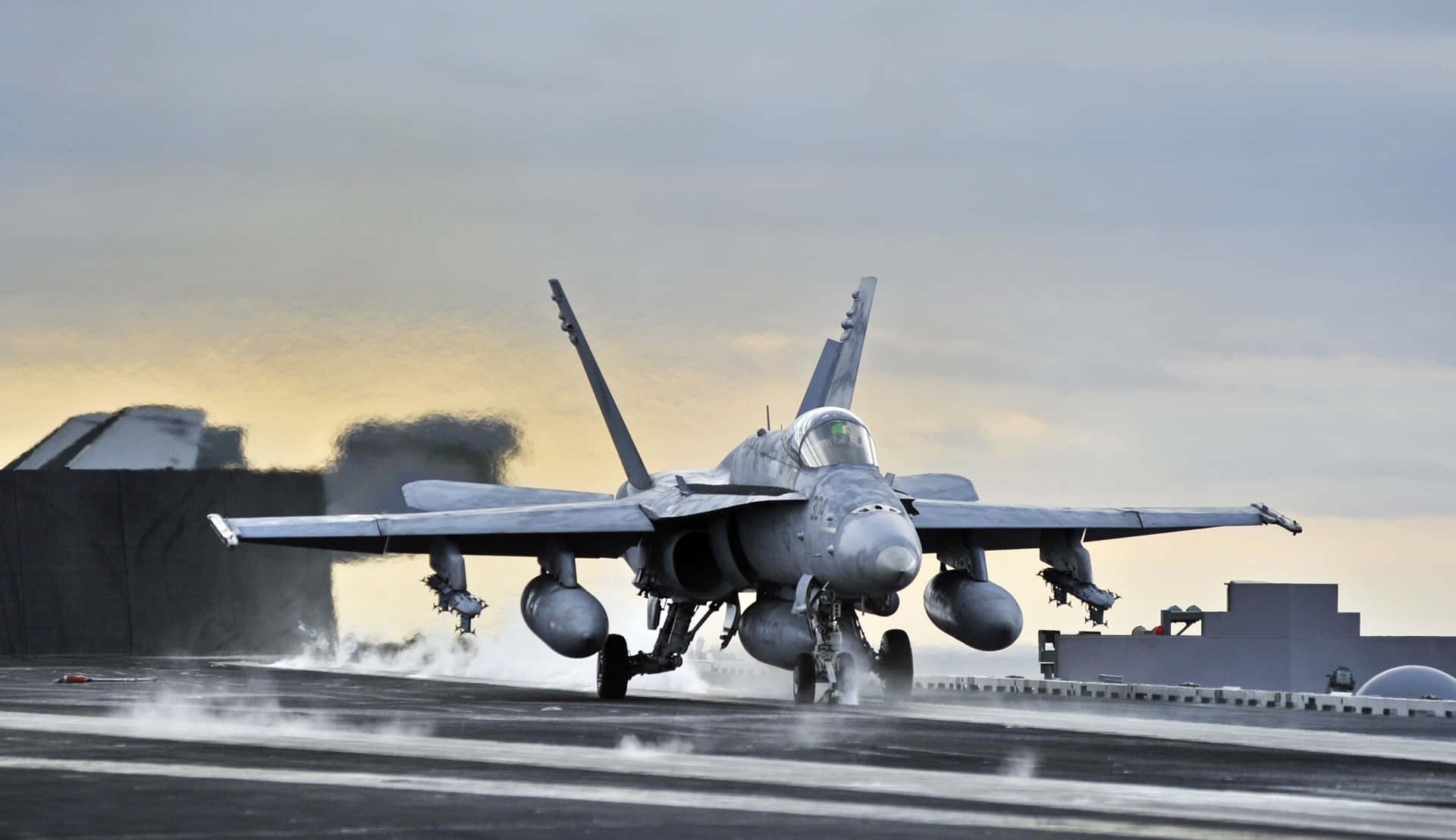 Powerful Military Plane Cruising Through The Skies Wallpaper