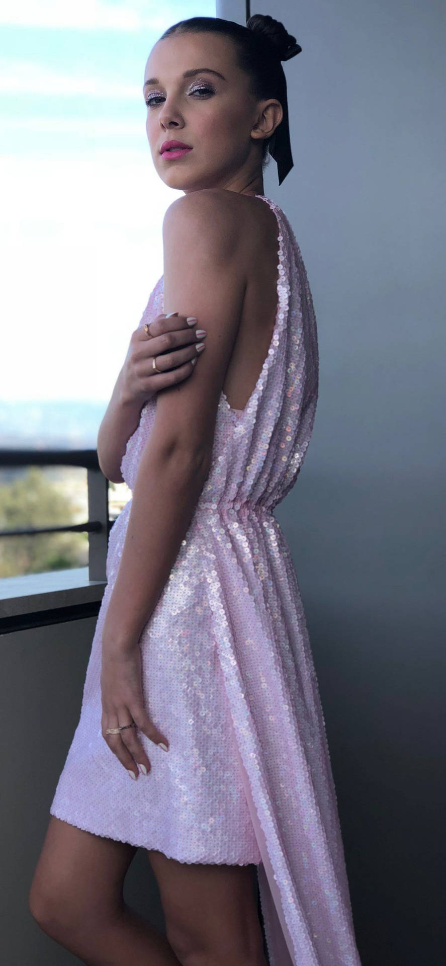 "Millie Bobby Brown looking stunning in a sparkly dress." Wallpaper
