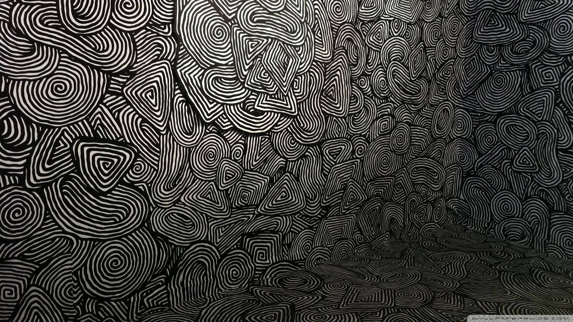 Black and white spiral pattern psychedelic wallpaper art.