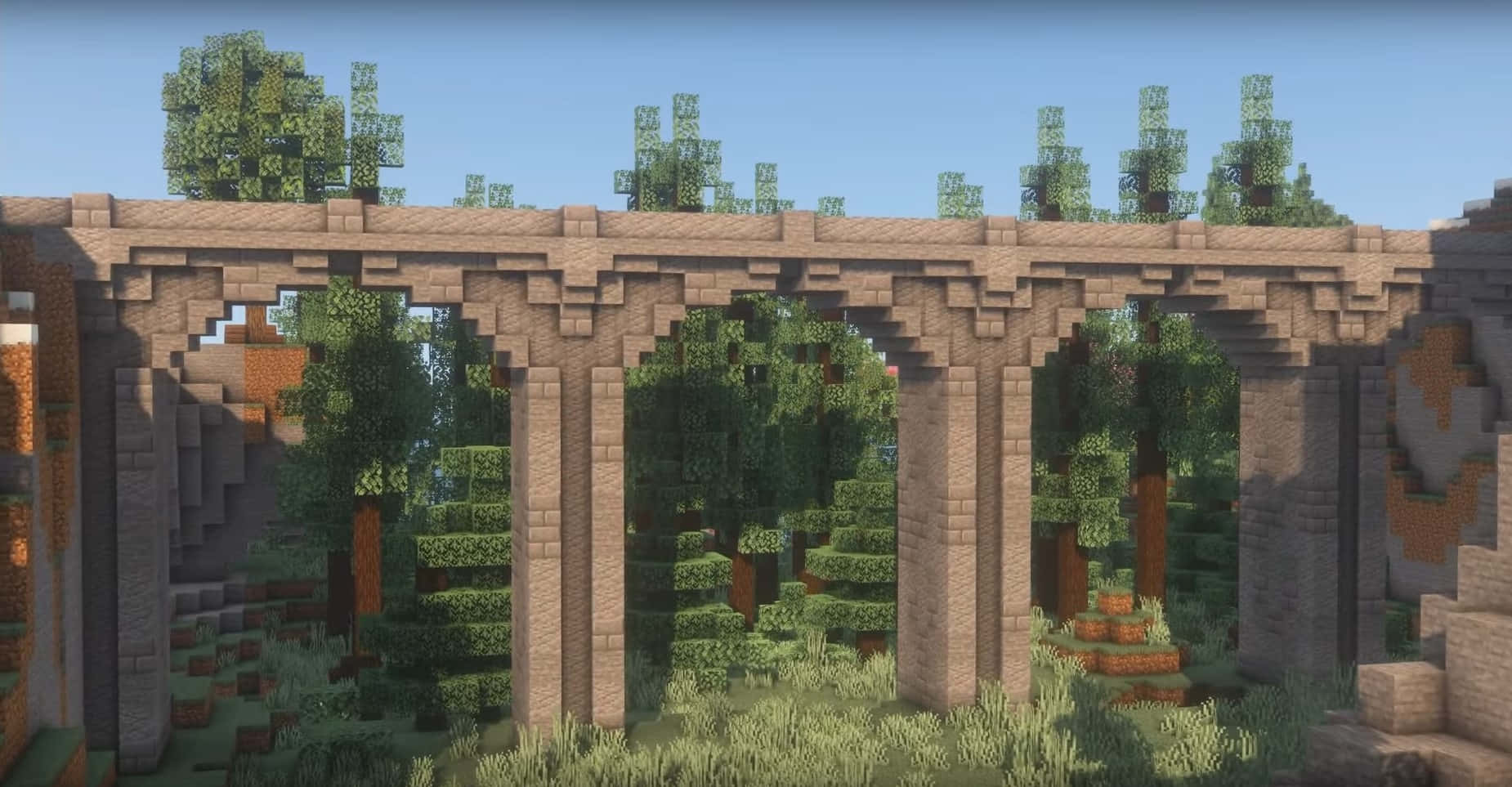 Enchanting Minecraft Bridge in Natural Terrain Wallpaper