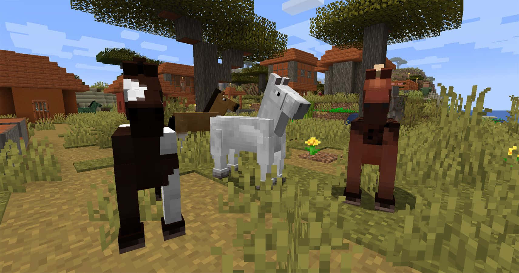 Majestic Minecraft Horses Exploring the Vast Landscape Wallpaper