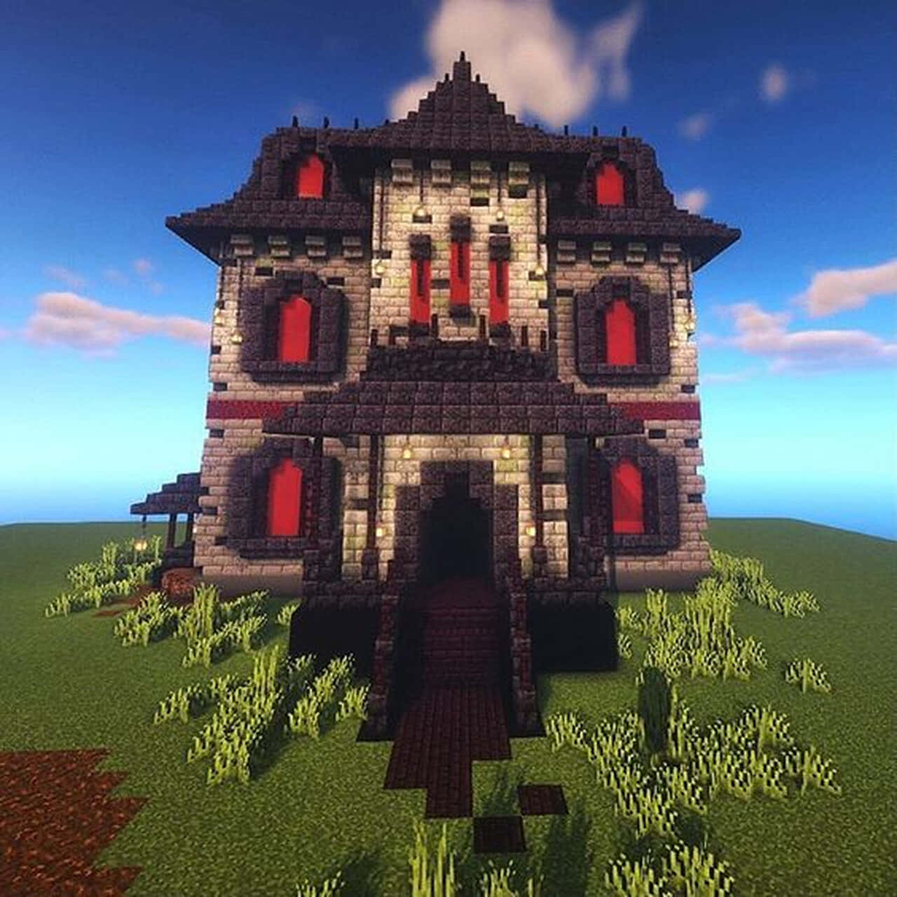 Et minecraft hus med et rødt tag og røde vinduer