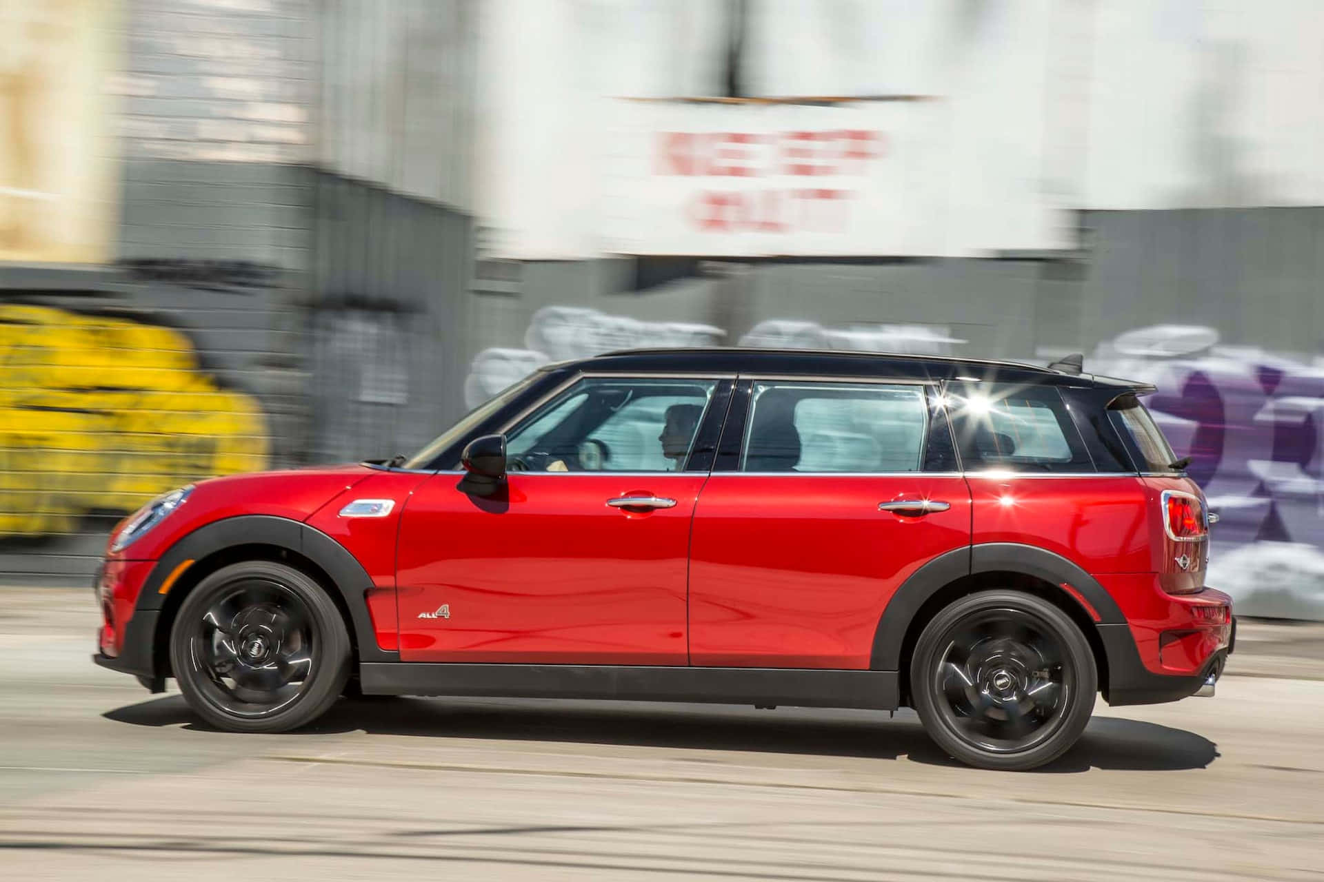 Captivating Mini Cooper S Clubman All4 in Action Wallpaper