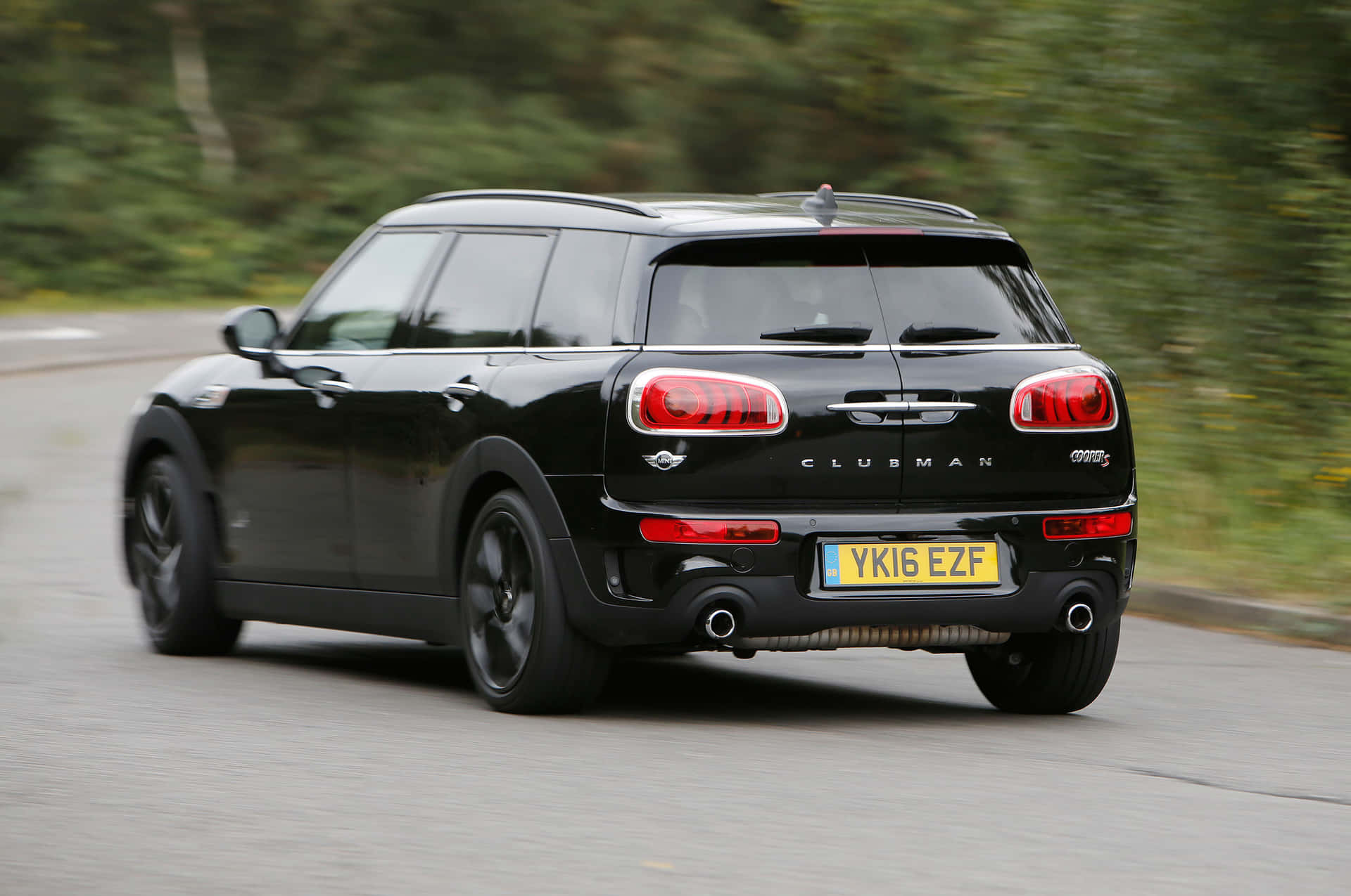 A Sleek Mini Cooper S Clubman All4 in Action Wallpaper