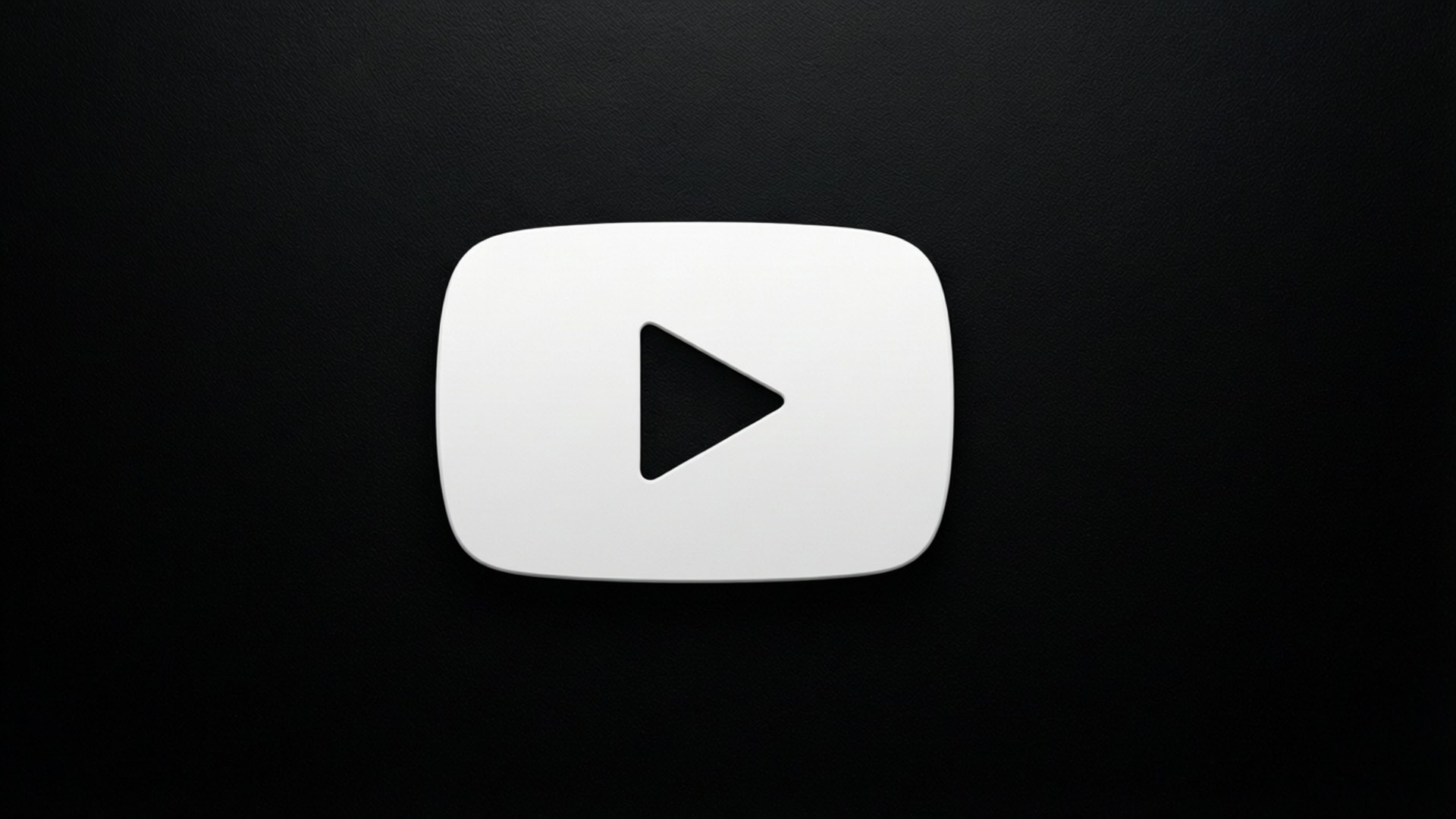 En enkel hvit YouTube-avspillingsknapp på en svart bakgrunn.